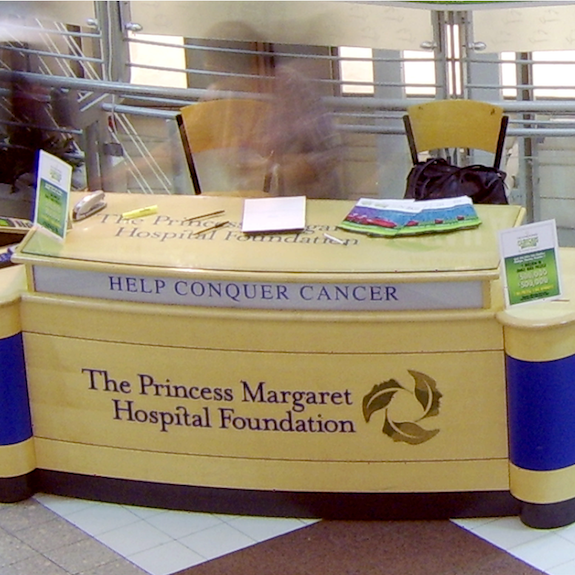 A yellow and blue table with the princess margaret hospital foundation logo.